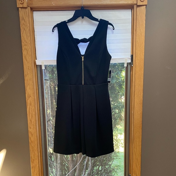 A “Must Have” Black Mini-Dress by Guess - Picture 1 of 6